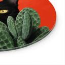 Tableau sur verre Chat noir caché dans les cactus Rond - Korenkova