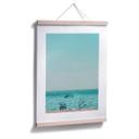 Póster en la playa
