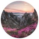 Fototapet - Rundt Seo - Klippelandskab ved solnedgang - vliesetapet/selvklæbende non-woven tapet