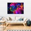 Canvasbillede, Monstera-blade i fluorescerende farver