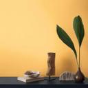 Gult non-woven tapet med en let tekstilstruktur fra A.S. Creation