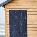 Strandfototapet kystcharme - farverige hytter ved havet - skudt af Clint