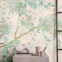 Akvarel med blomstergrene tapetmaleri i pastelblå - ikke-vævet tapet med et delikat look