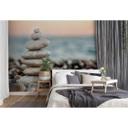 non-woven tapet Stone Beach fototapet med foto af havet strand fototapet Designwalls i grå og blå 