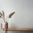 Papel pintado no tejido de color blanco con motivo de rombos y gráfico geométrico