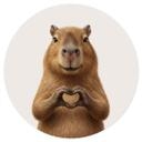 Sticker mural Capybara avec main en cœur - rond