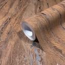 Non-woven tapet med en skinnende, grov struktur i brunt gipslook
