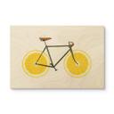 Cuadro de madera de una bicicleta con fondo de limón