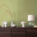 Alegre papel pintado de tejido-no tejido en verde hierba con una sutil textura - Diseño mural vigorizante