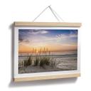 Póster duna en la playa al atardecer