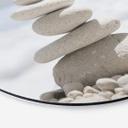 Tableau sur alu-Dibond rond Pierres au bord de la mer
