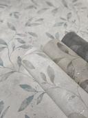Non-woven tapet med bladmønster og metallic-effekt i hvidt blomstermønster 