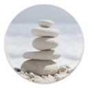 Tableau sur alu-Dibond rond Pierres au bord de la mer
