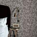 Ornamentalt tapet Opus brun