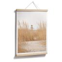 Póster faro en la hierba de las dunas