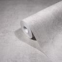 Non-woven tapet i ensfarvet beige tekstureret betonlook 