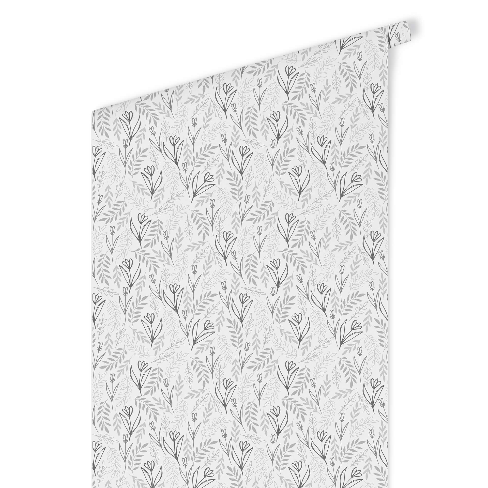 Patroonbehang met grafische bloemen - bloemenveld zwart-wit