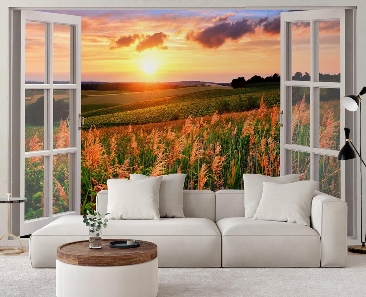 Fototapete Fenster - Blick auf den Sonnenuntergang über der Wiese