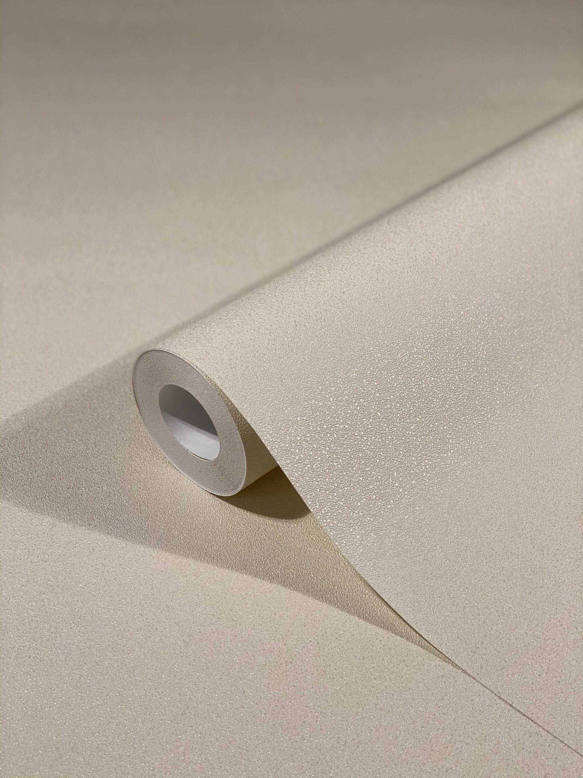 Non-woven tapet med en let skinnende beige ensfarvet tekstur af Harald Glööckler