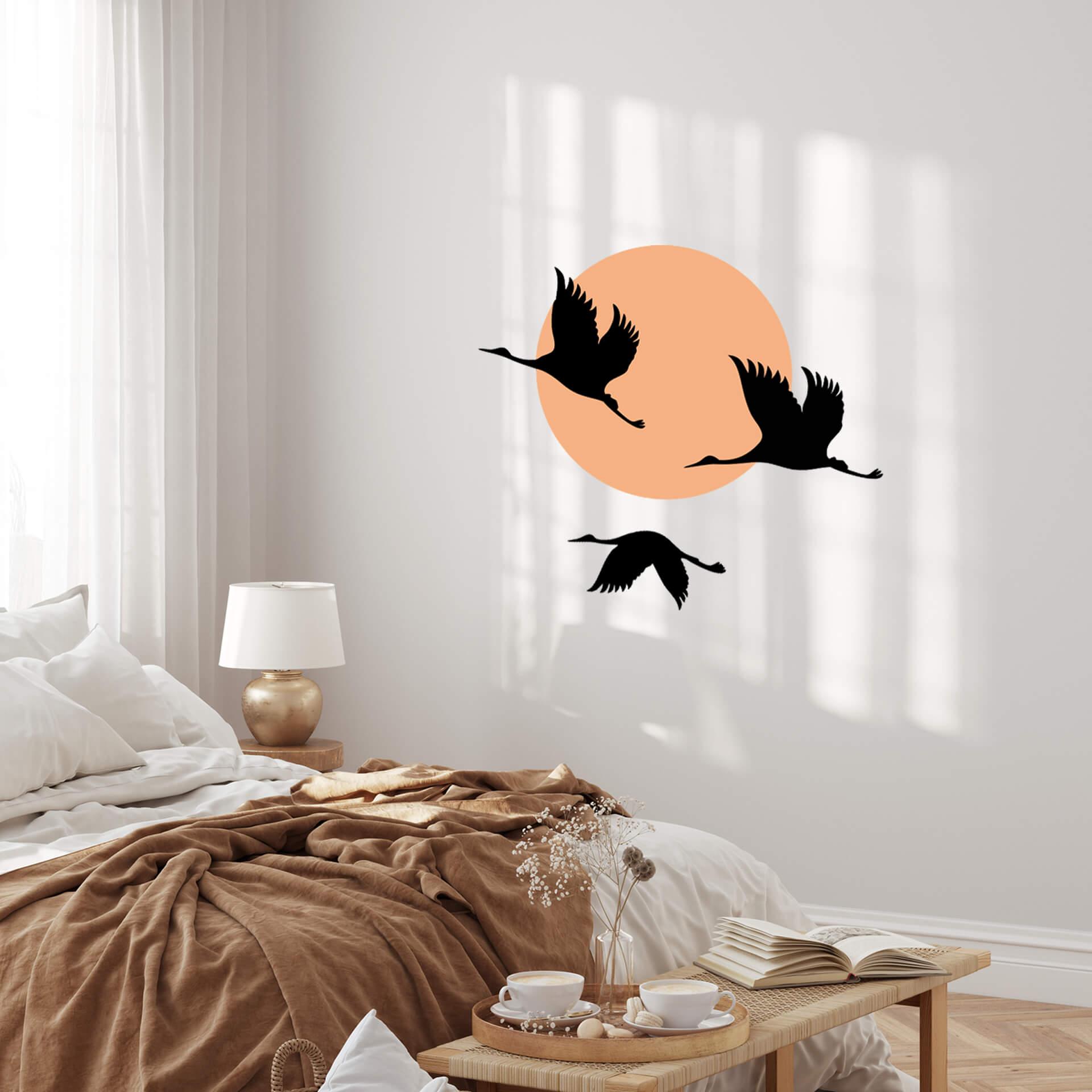 Sticker mural Grues au coucher du soleil