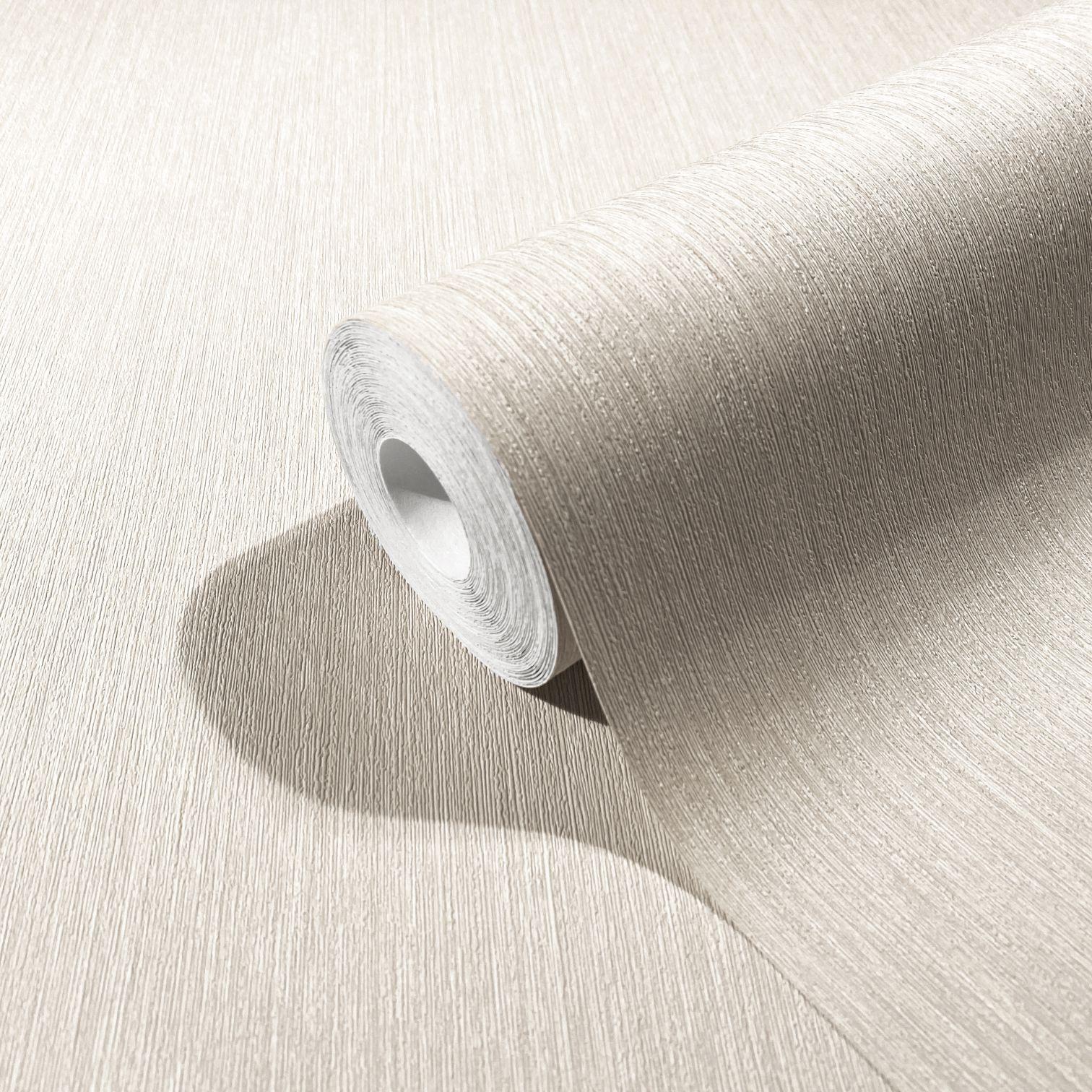 Vliesbehang met fijne lijnen en lichte textuur beige effen