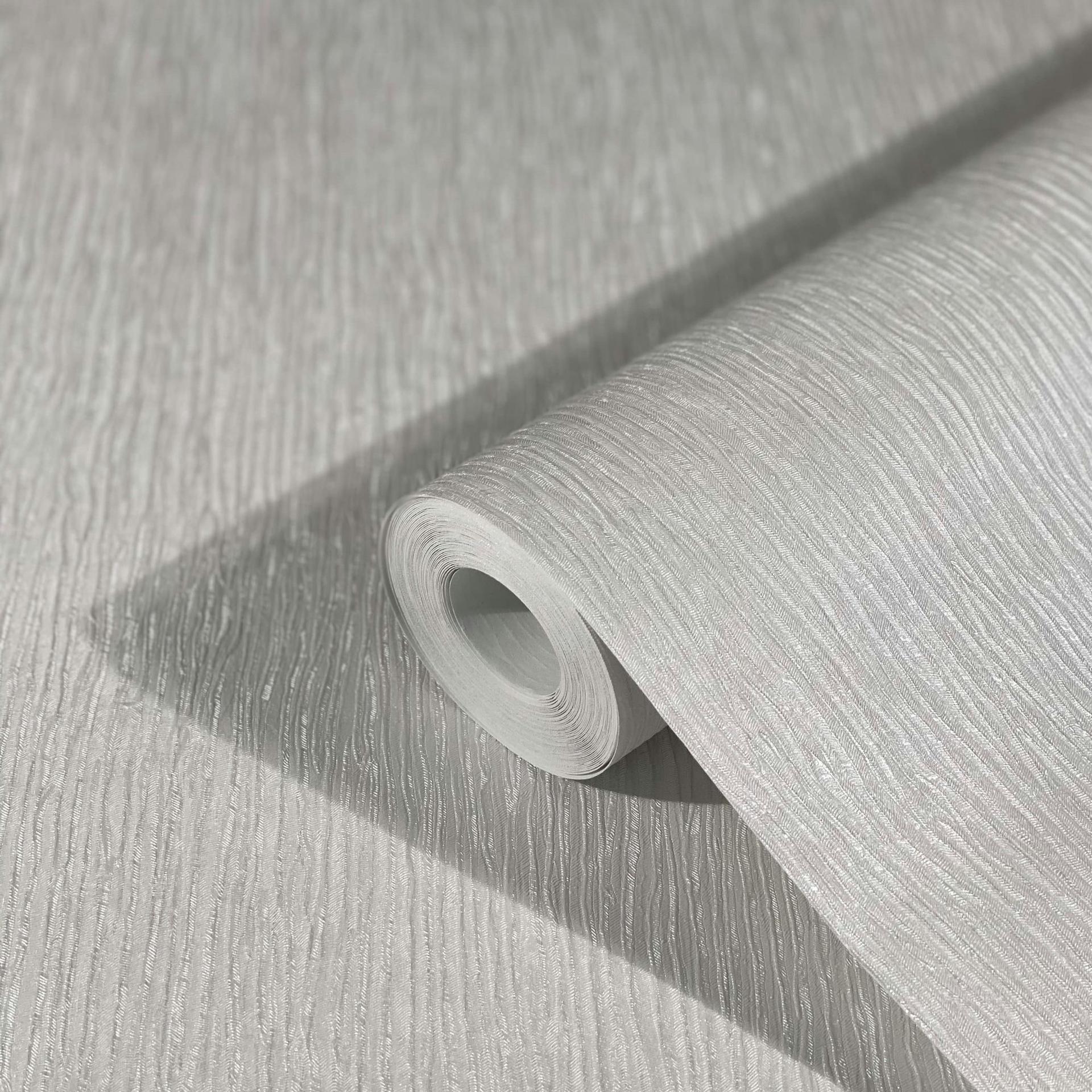 Non-woven tapet med let tekstur i ensfarvet grå
