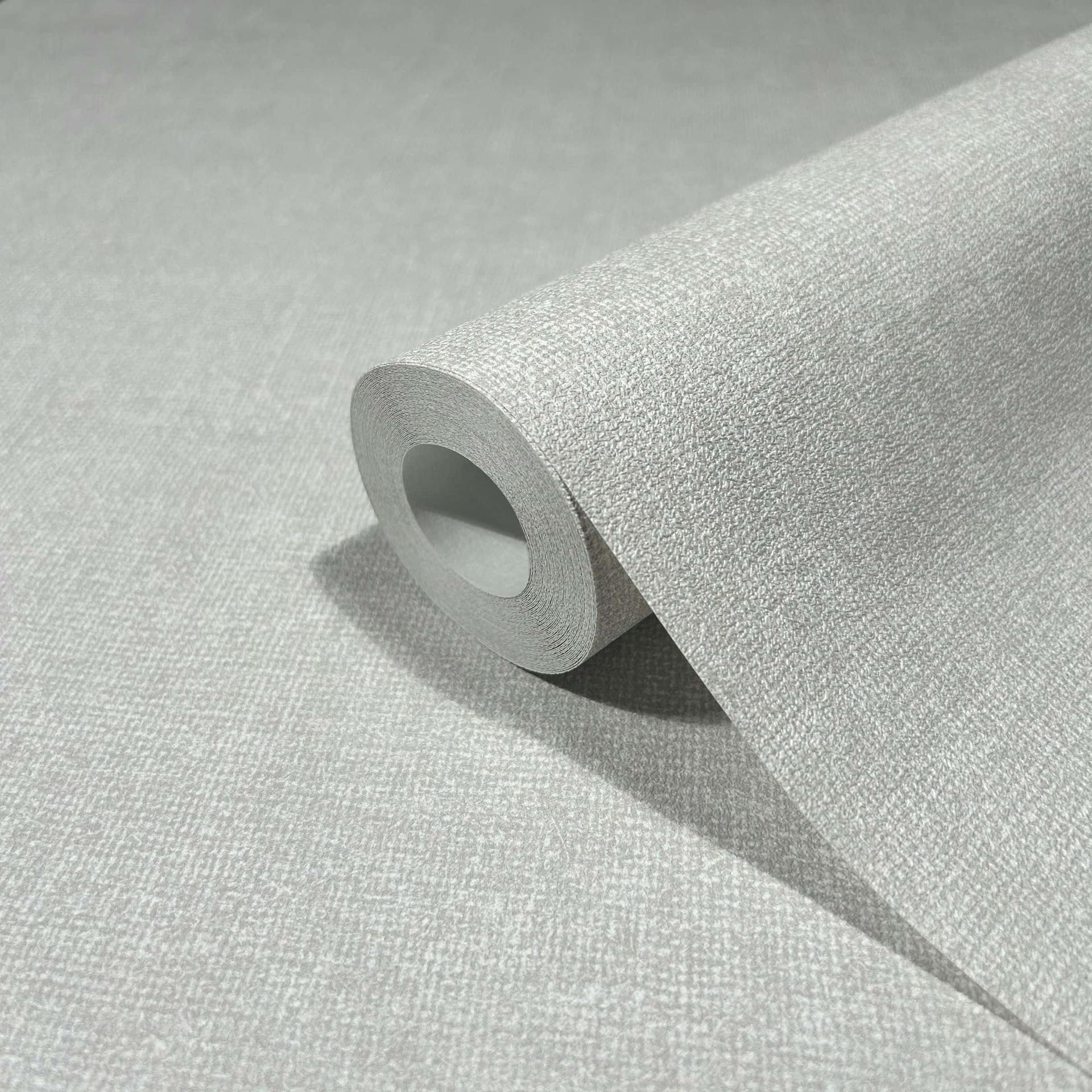 Non-woven tapet i moderne tekstureret ensfarvet grå uni