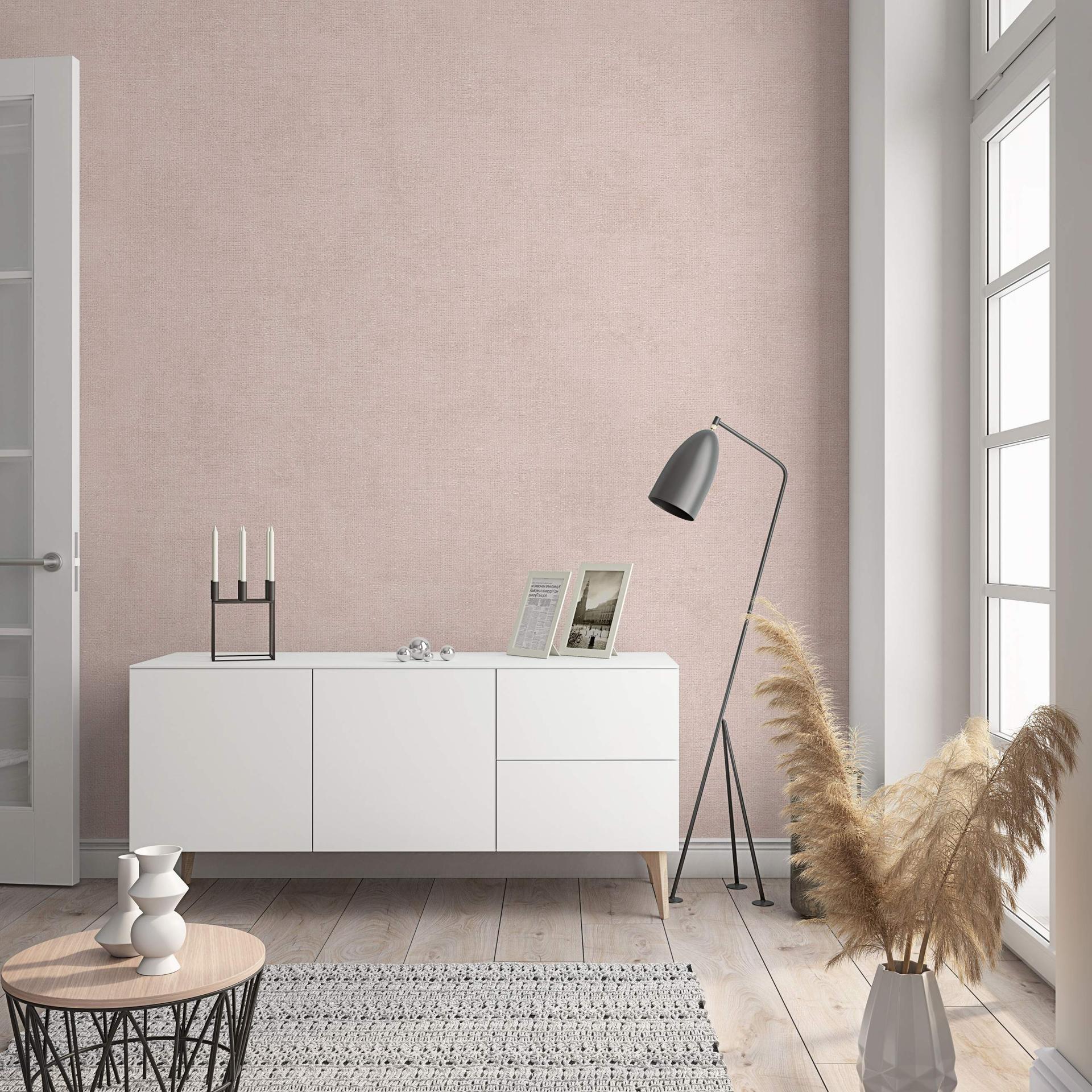 Non-woven tapet med moderne monokromt look og tekstur i rosa ensfarvet