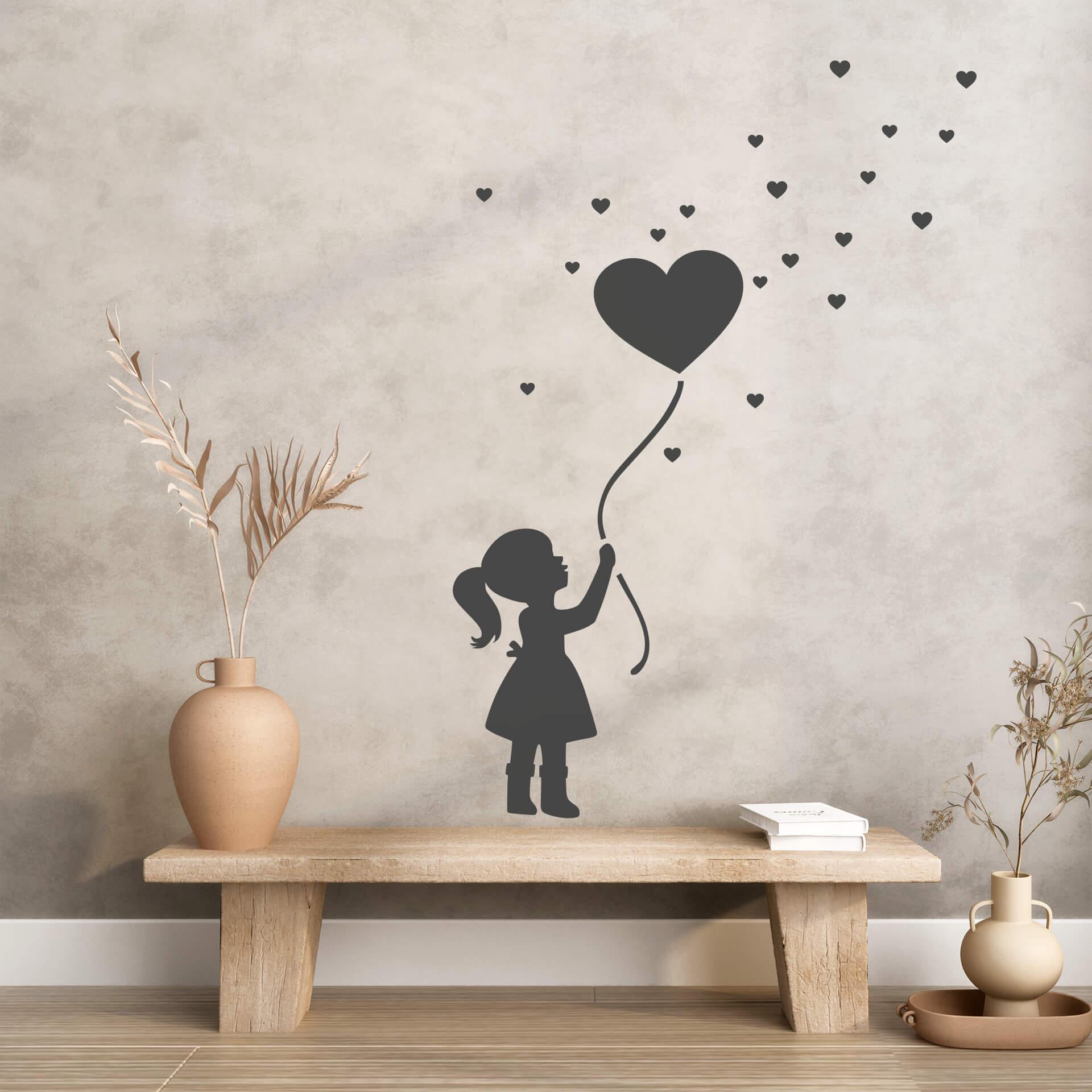 Wallsticker Pige med hjerteballon