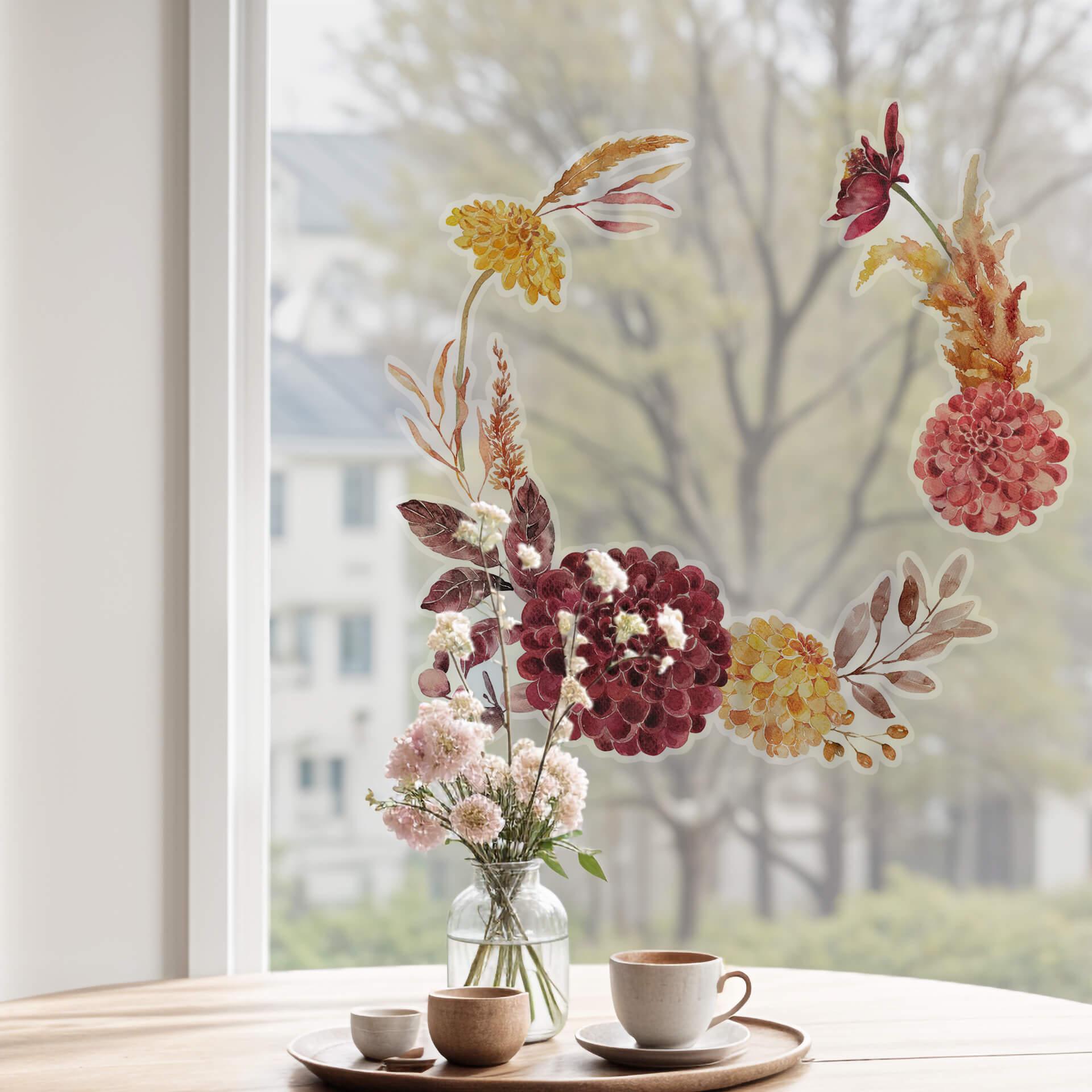 Corona de flores otoñales para la ventana