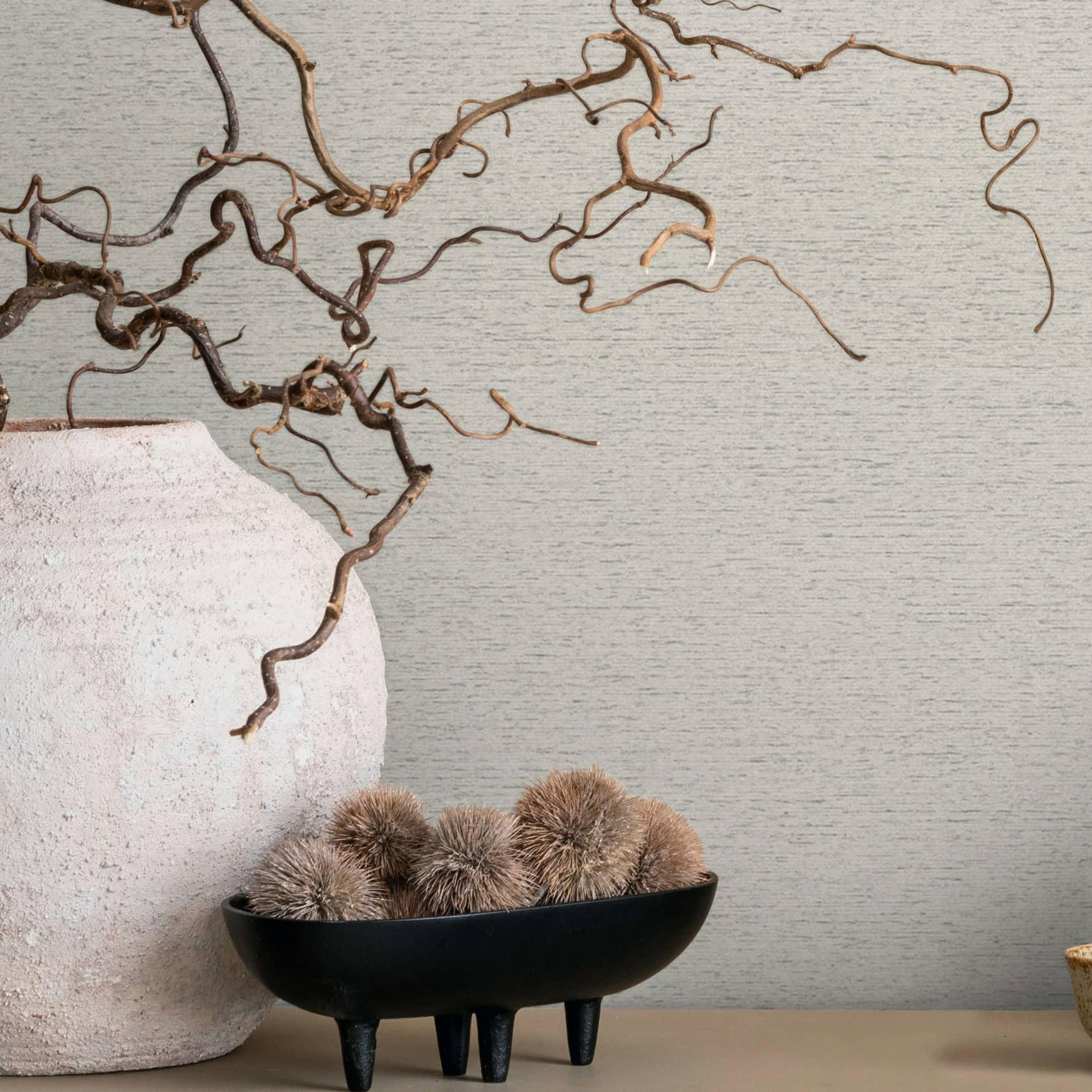 Non-woven tapet i et let meleret look som almindelig grå, beige struktureret