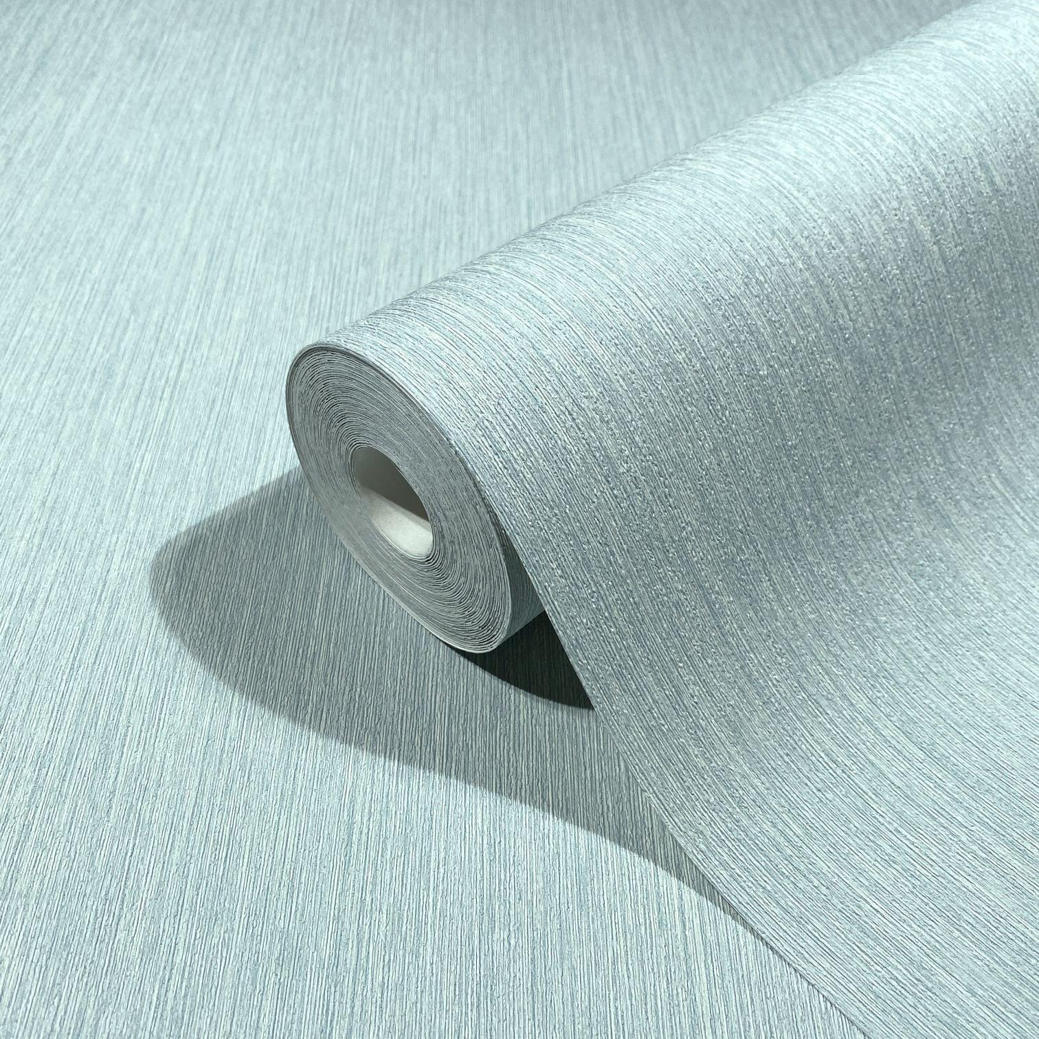 Vliesbehang met fijne lijnen en lichte textuur blauw effen
