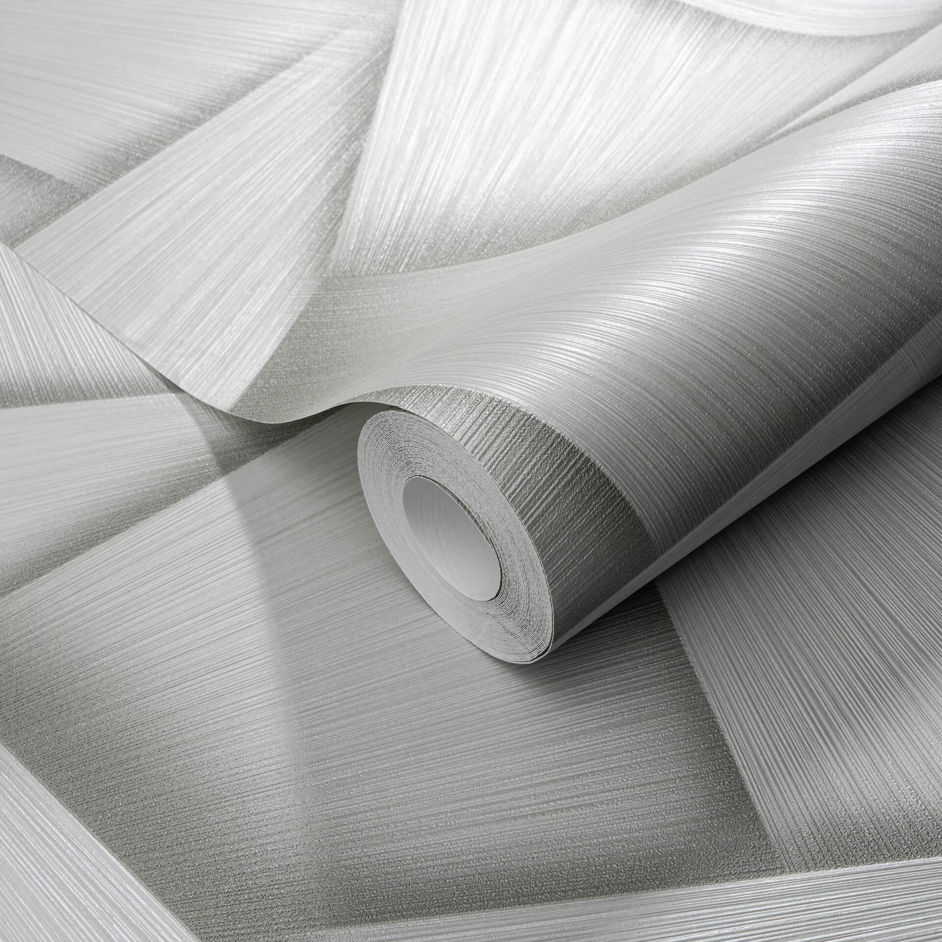 Non-woven tapet med geometriske former og metallisk effekt i grøn