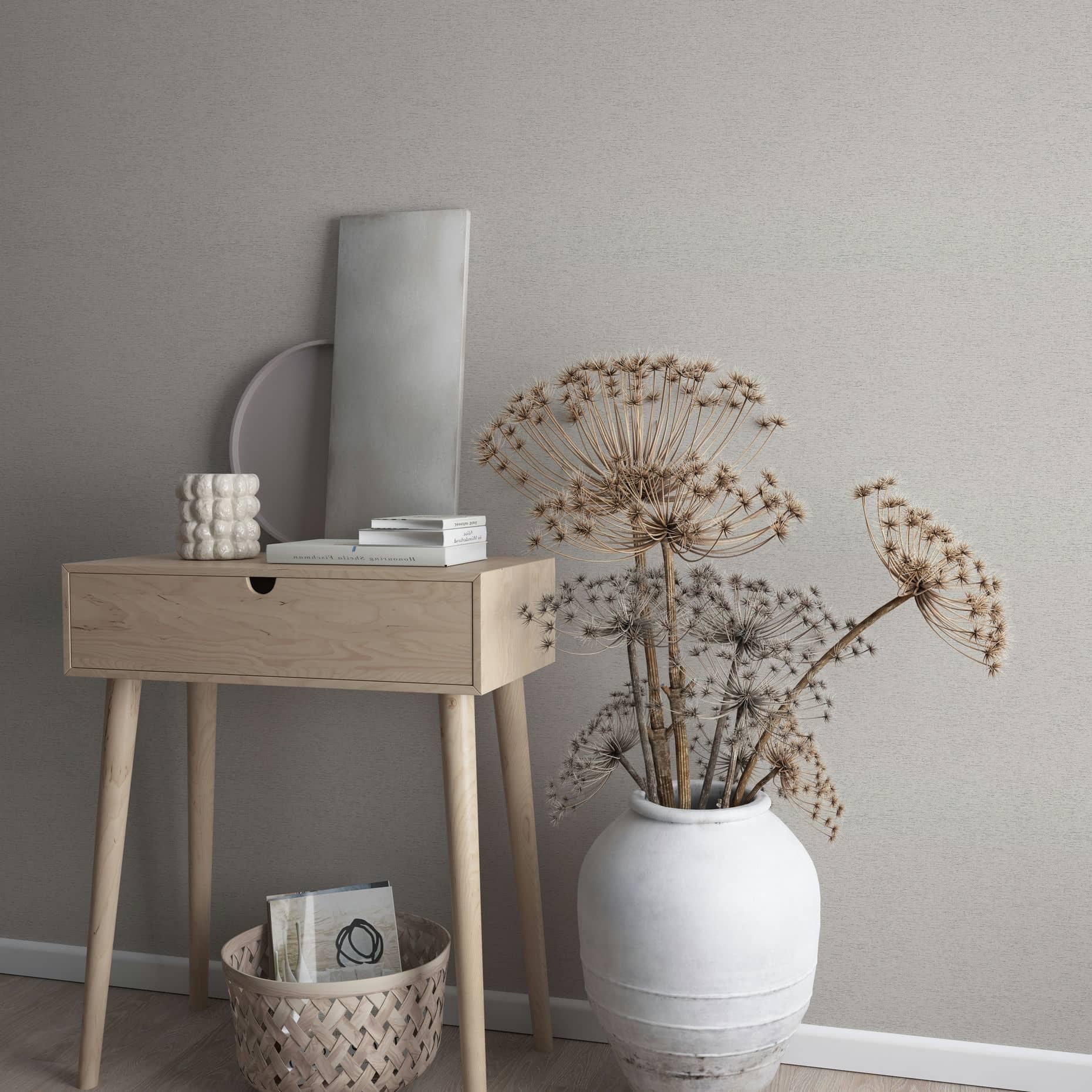 Vliesbehang in een licht gevlekte look als effen grijs, beige structuur