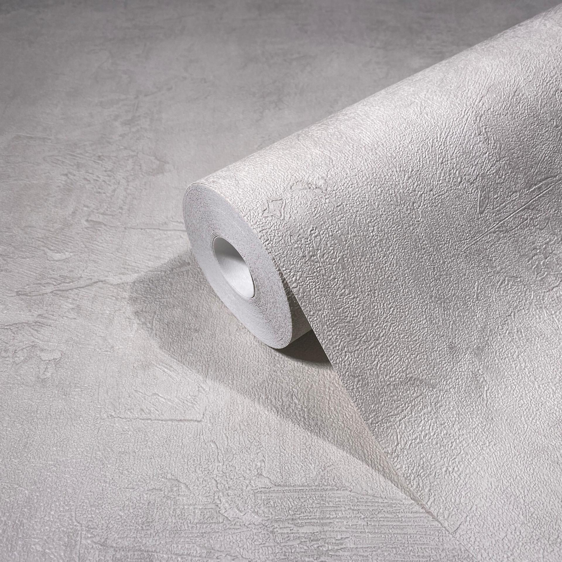 Non-woven tapet i ensfarvet beige tekstureret betonlook