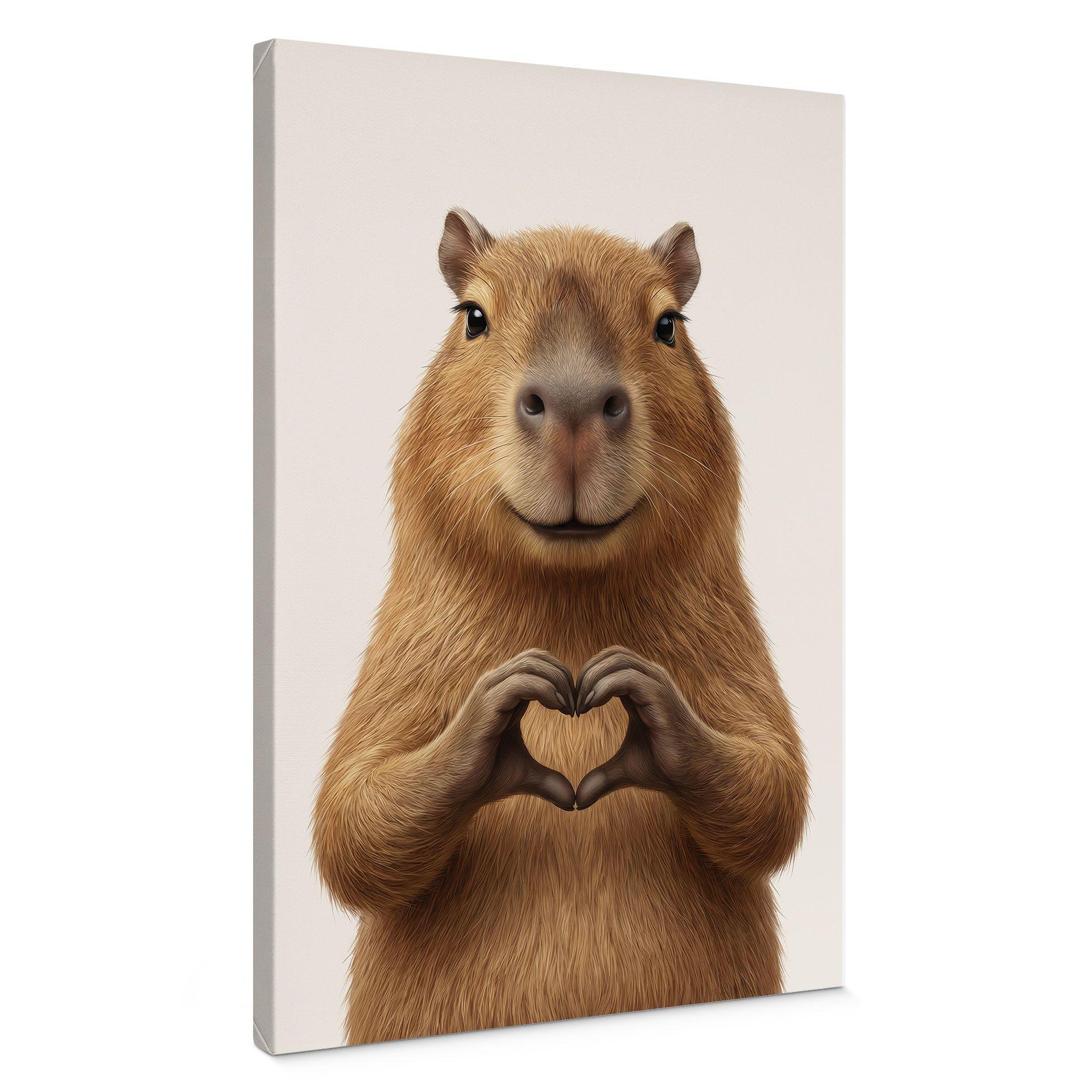 Canvasbillede Capybara med hjertehånd