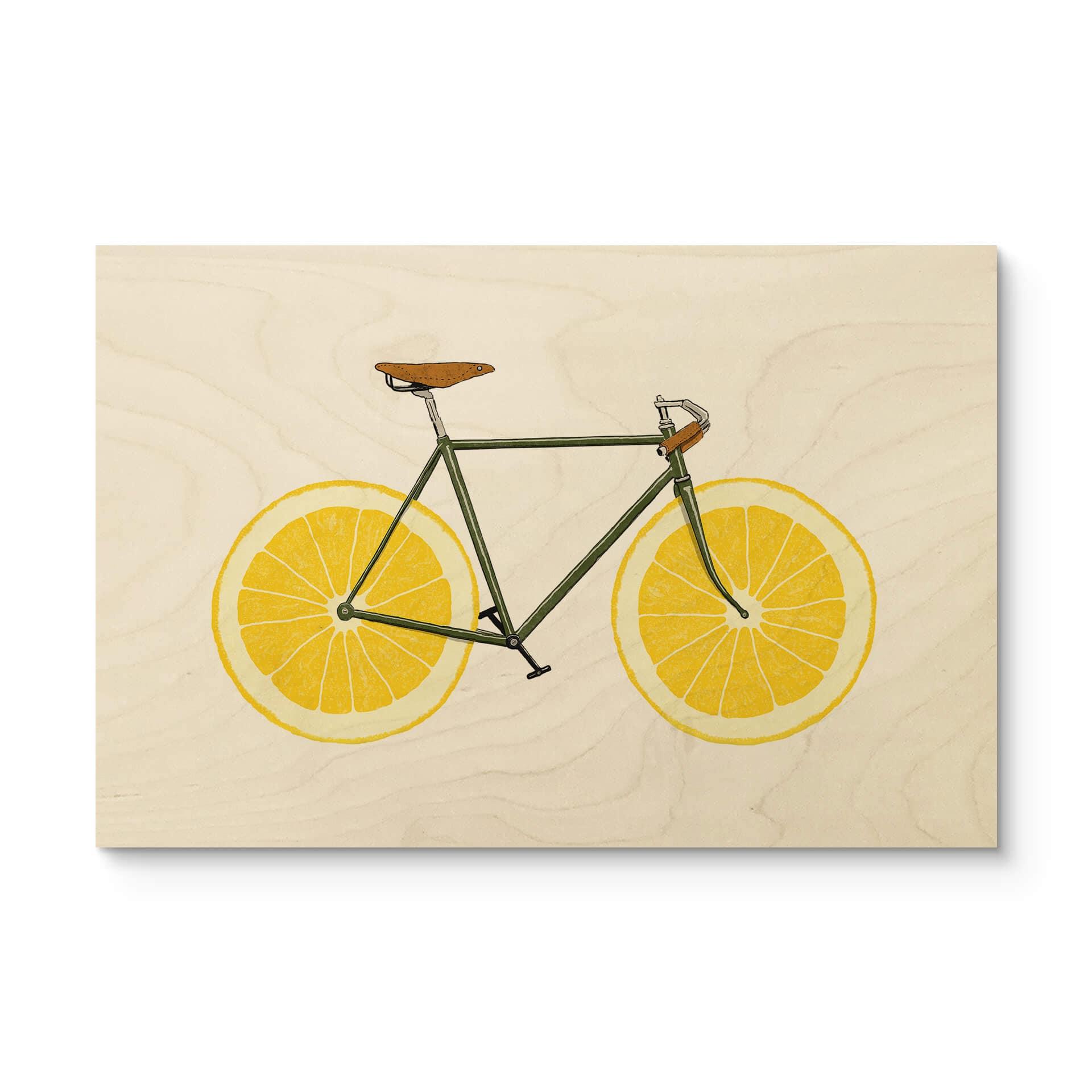 Cuadro de madera de una bicicleta con fondo de limón