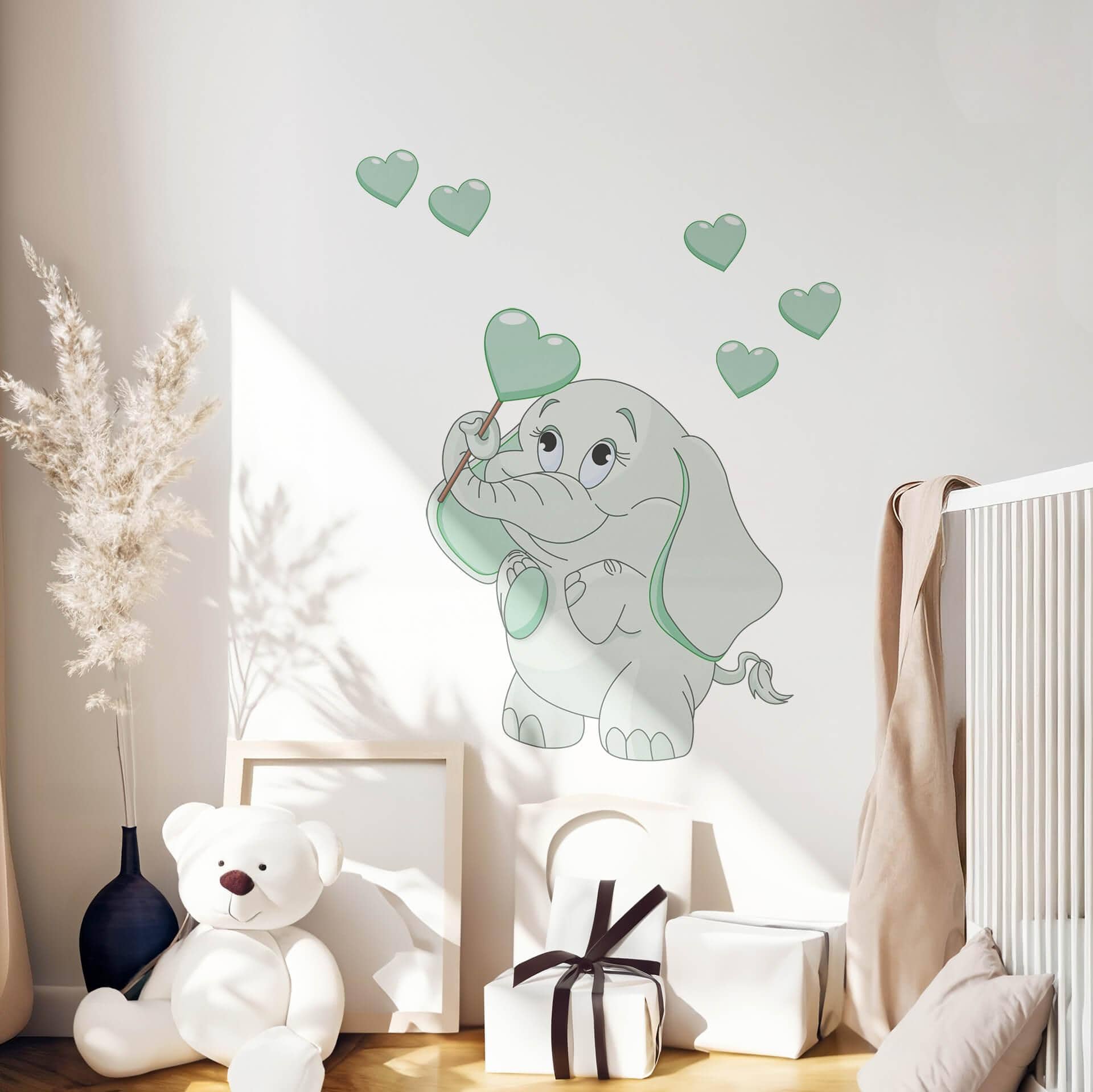 Sticker mural - Bébé éléphant avec cœurs (vert)