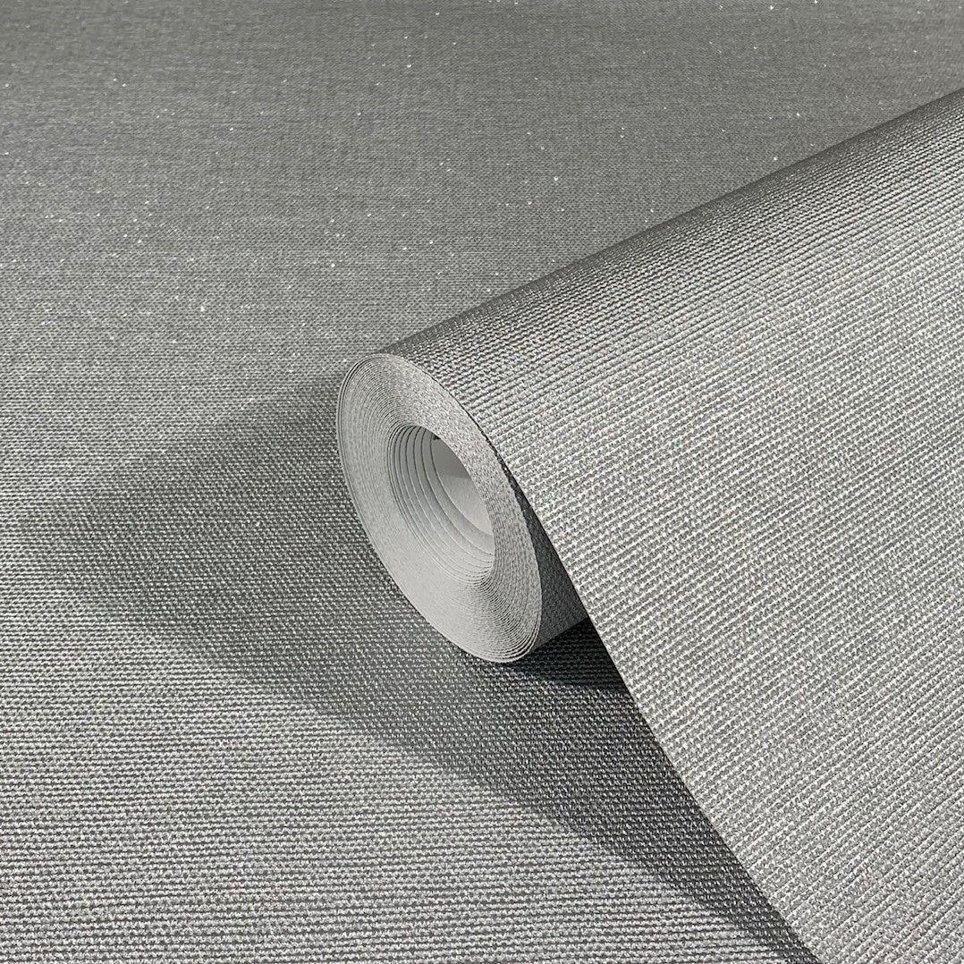 Non-woven tapet med let struktureret overflade i massivt sølv 