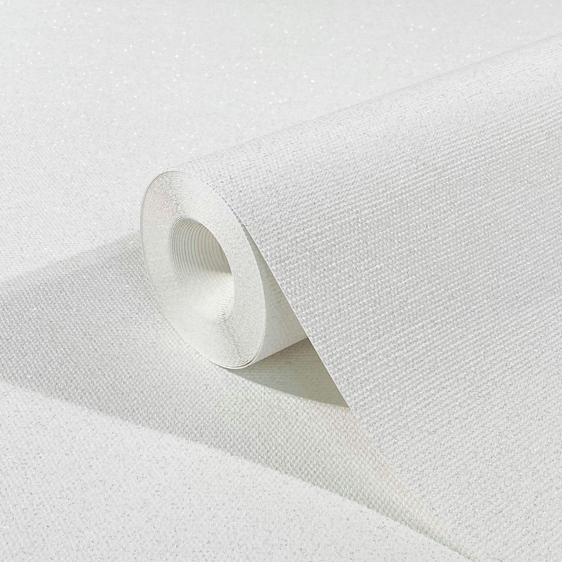 Non-woven tapet med et let tekstil-look i ensfarvet hvid struktur 