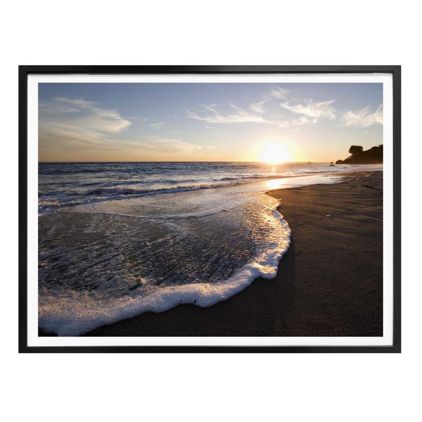 Póster Puesta de sol junto al mar