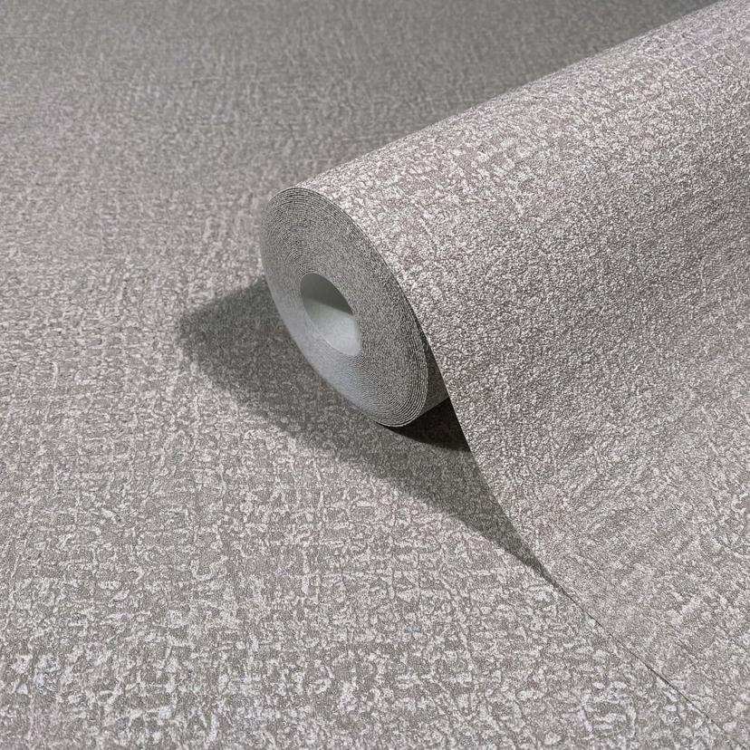 Non-woven tapet i grå texturerad textil med putsad look