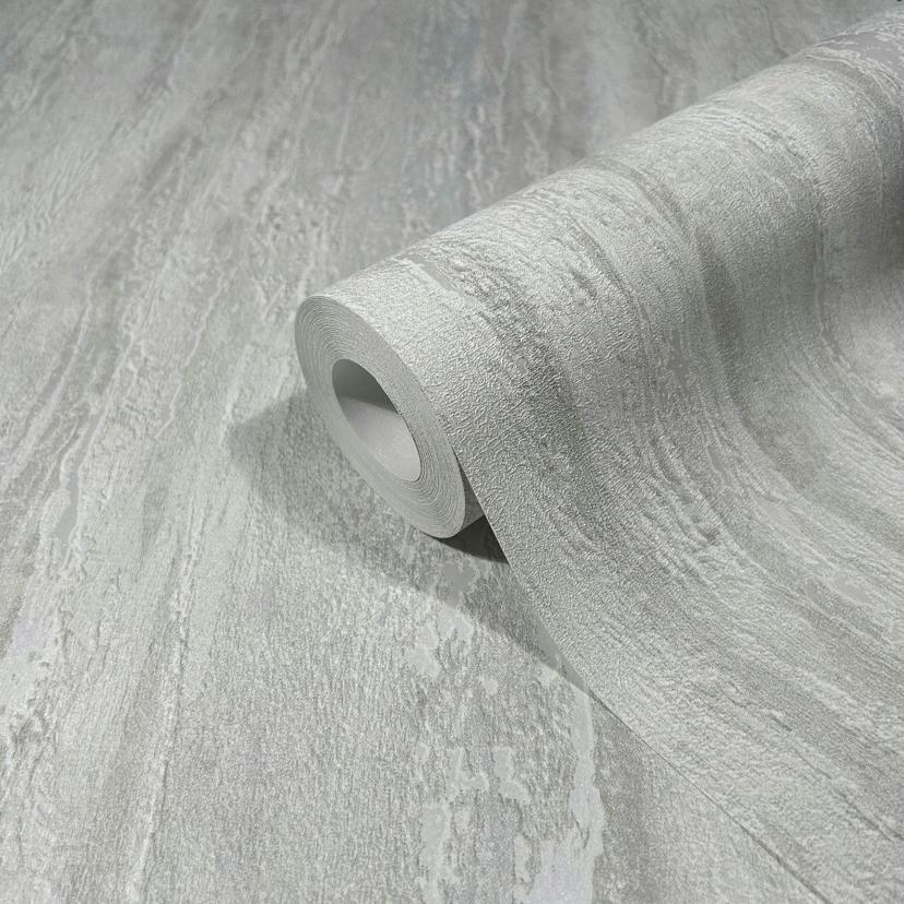 Non-woven tapet med en blank, grov struktur i grå gipslook