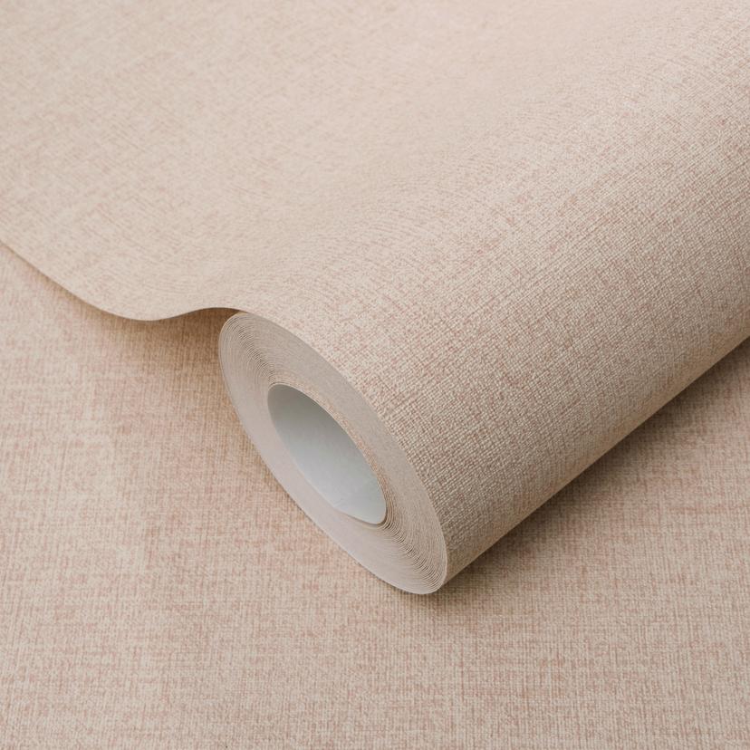 Papel pintado no tejido de color beige rosado liso con una fina textura de lino, sutilmente moderno