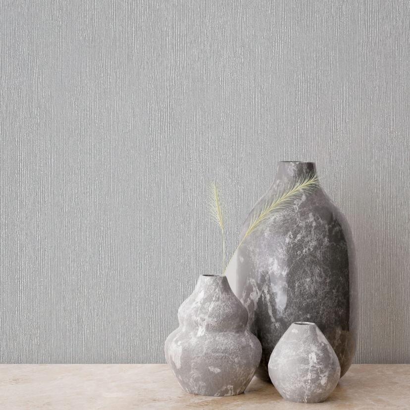 Non-woven tapet i tekstil-look med struktureret overflade grå ensfarvet
