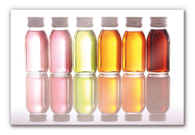 Akrylbillede Olieflasker i glas