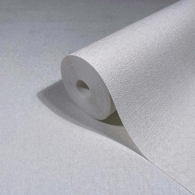 Non-woven tapet i vit strukturerad gips ser vanlig ut