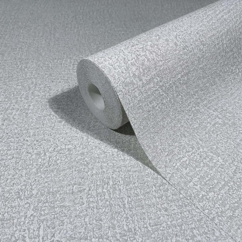 Non-woven tapet i grått, vit texturerad textil i putsutseende