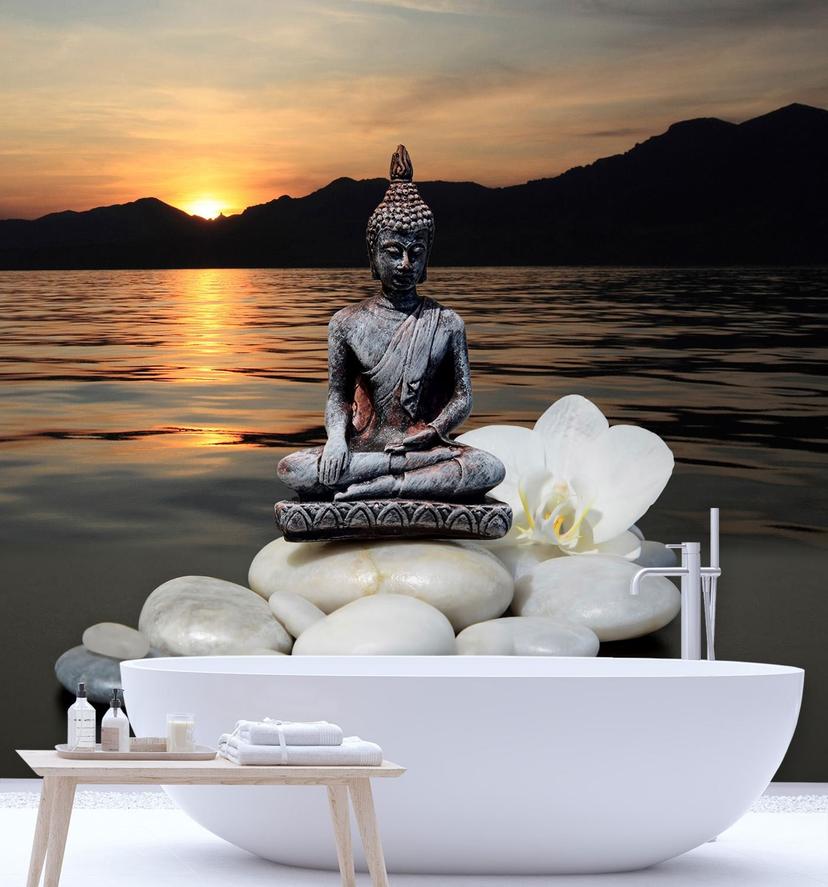 Fototapete, Buddha-Figur auf den Steinen bei Sonnenuntergang