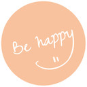 Naklejka na ścianę Be happy w kolorze brzoskwiniowym - okrągła